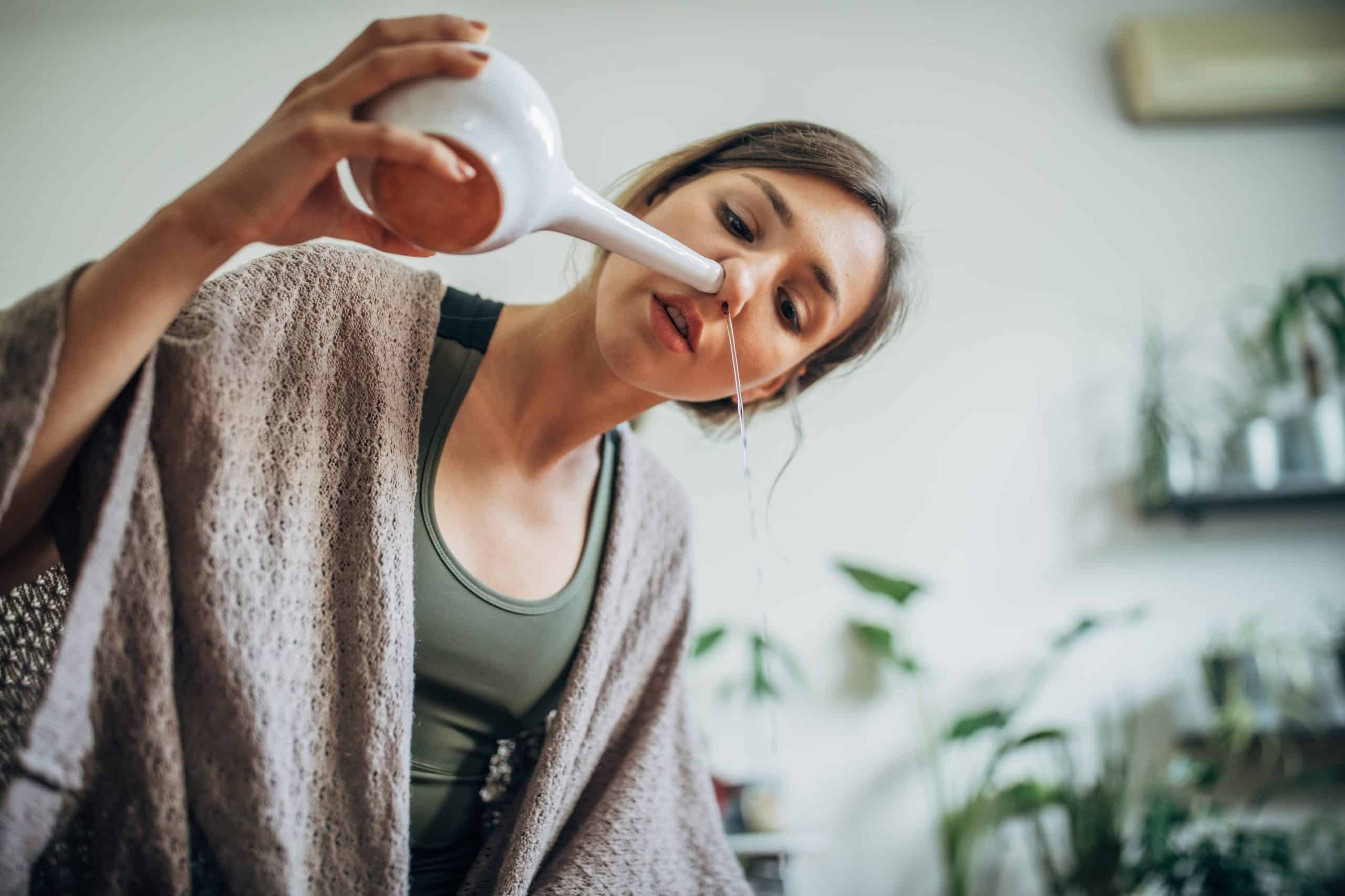 Nasal Irrigation - Neti Pot clearing nasal cavity relieving sinusitis