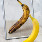 Spoilt banana in mirror representing body dysmorphia