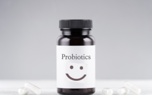 Bottle of probiotics supplements for gut health benefits.